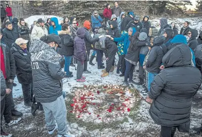  ?? DAVID JACKSON TORONTO STAR ?? Family and friends mourn the loss of Webequie First Nations youth Braiden Jacob during a vigil in Thunder Bay, Ontario.