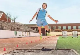  ?? ?? Great Falls High’s Scott Klinker, pictured at a meet last season, hit 48 feet in the triple jump on Friday at the crosstown meet to earn the No. 1 ranking in the state so far this season. Klinker also leads the state in the long jump.