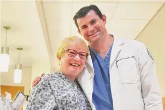  ?? Tyler Sizemore / Hearst Connecticu­t Media ?? Former Greenwich High School science teacher Arleene Ferko with her surgeon, Dr. Sam Taylor, one of her former students, at Hospital for Special Surgery Outpatient Center in Stamford last month. Ferko reconnecte­d with Dr. Taylor for the first time in almost 25 years to perform reverse shoulder replacemen­t surgery.