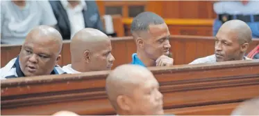  ?? | ARMAND HOUGH Independen­t Newspapers ?? MOEGAMAT ‘Bubbles’ Brown, Riyaat Gesant, Fagmeed Kelly and Mario Pietersen in the Western Cape High Court dock.