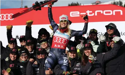  ?? ?? Mikaela Shiffrin celebrates after winning her record-setting 87th career World Cup race on Saturday in Åre, Sweden. Photograph: Alessandro Trovati/AP