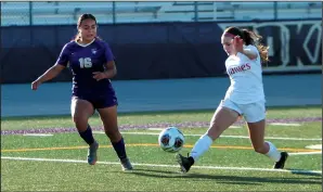  ?? COURTESY PHOTO BY JENNIFER HOWELL ?? Lodi's Farrah Bender, right, moves the ball upfield past Tokay's Daisy Hernandez during Wednesday's 3-3 tie between the teams.