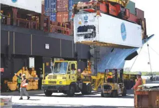  ?? — AFP ?? FORT LAUDERDALE, Florida: This file photo taken on June 23, 2016 shows shipping containers offloaded from a cargo ship at Port Everglades.