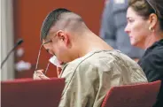  ?? GABRIELA CAMPOS/THE NEW MEXICAN ?? Jordan Anthony Nuñez wipes away a tear while listening to his mother testify Wednesday. A judge ruled that Nuñez will be held in jail until trial.