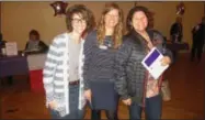 ?? PHOTO SPECIAL TO THE DISPATCH BY MIKE JAQUAYS ?? Jennifer Armlin, left, Melanie Francis, center, and Amy Kotwica pose after the Relay for Life of Madison County Kickoff party Jan. 16at the Kallet Civic Center in Oneida.