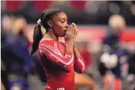 ?? JEFF ROBERSON/ASSOCIATED PRESS FILE ?? American gymnast Simone Biles says she’s worried how she’ll perform in an empty venue during the upcoming Olympics because she says likes to feed off the crowd.