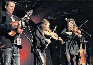  ??  ?? Members of Coig perform during the Celtic Colours Internatio­nal Festival show Pjila’si: A Wagmatcook Welcome on Saturday night.