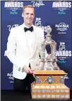  ?? (AP) ?? In this June 20, 2018 file photo, Pekka Rinne of the Nashville Predators poses with the Vezina Trophy after winning the award at the NHL Awards in Las Vegas.