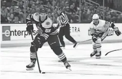  ?? BRIAN FLUHARTY/USA TODAY SPORTS ?? Bruins left wing Erik Haula controls the puck against the Penguins on Saturday.