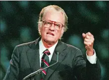  ?? JOHN BAZEMORE, FILE/AP PHOTO ?? In this Oct 26, 1994, file photo, evangelist Billy Graham begins his sermon in Atlanta’s Georgia Dome.