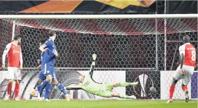  ??  ?? THUNDERBOL­T: Al Musrati’s powerful shot beats Kasper Schmeichel to put Braga in front. Right, Barnes equalises for City. Below, the Braga keeper punches the ball away and Maddison strikes a free kick