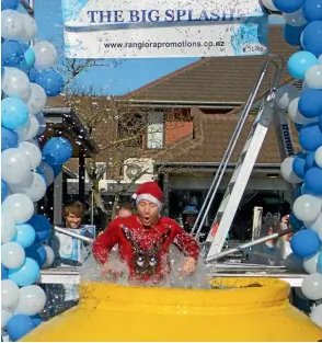  ??  ?? Rangiora Promotions vice chairman Chris Boivin feels the cold during last year’s Big Splash fundraiser in Rangiora. Support from real estate company Bayleys has made it possible for the event to return this year on Saturday June 23.