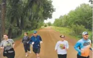  ?? Craig F. Walker, Denver Post file ?? Danielle Huskey, Laura Mattern, Steve Schwartz, Jessica Schultz and Richard Kalasky set out on a run at Waterton Canyon.