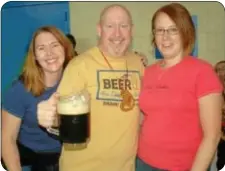  ??  ?? Representi­ng Cobbleston­e Brewing Company are, from left, Carolyn Grace, Ken and Anne Ogborn.