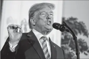  ?? AP PHOTO ?? President Donald Trump delivers a statement on the Iran nuclear deal from the Diplomatic Reception Room of the White House on Tuesday.