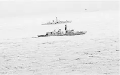  ??  ?? Images from an infrared camera on a helicopter show Royal Navy frigate HMS St Albans escorting Russian warship Admiral Gorshkov as it passes close to UK territoria­l waters through the North Sea in an image from an infrared camera on a helicopter handed...