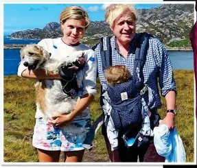  ??  ?? GETTING AWAY: Boris, Carrie and Wilf on holiday in Scotland