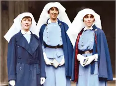  ?? DEPARTMENT OF NATIONAL DEFENCE/LIBRaRY AND ARCHIVES CANADA/THE VIMY FOUNDATION ?? They Fought in Colour includes scenes of warmth and joy — such as this photo of nursing sisters, from left, Mowat, McNichol and Guilbride — but it’s not a sugar-coated treatment of the war.