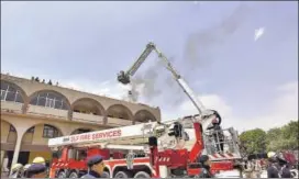  ?? SANJEEV VERMA/HT FILE ?? Gurugram fire department is heavily dependent on private fire services. The ban of firecracke­rs may help reduce incidents but they particular­ly lack capability to tackle fires in high rises.