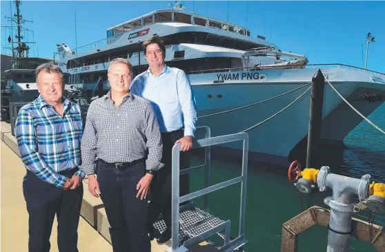  ?? ON BOARD: YWAM supporters Peter Tapiolas, Daryl Holmes and Peter Honeycombe in front of the YWAM vessel. Picture: SCOTT RADFORD- CHISHOLM ??