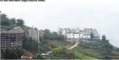  ??  ?? New hotels under constructi­on on the hillside in northern Sapa tourist town.