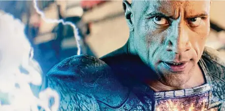  ?? Warner Bros. Pictures ?? Dwayne Johnson takes on the tile role in “Black Adam.”