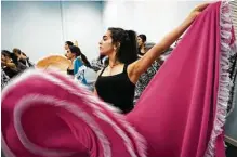  ?? Marie D. De Jesús / Houston Chronicle ?? Paula Urdaneta dances to Venezuelan folk music at Danmar Art and Dance Studio, which teaches traditiona­l dances like the flamenco, in Katy.