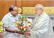  ?? PTI ?? Karantaka Chief Minister HD Kumaraswam­y meets Prime Minister Narendra Modi in New delhi, on Monday