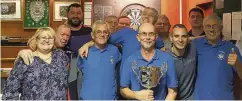  ??  ?? Players from the Wellington Inn celebrate winning the Terry Abbott Memorial Cup after beating Widnes Bowling Club in a fantastic final that went to the very last contest.