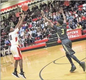  ?? / Contribute­d by Gail Conner ?? The Cedartown Boys basketball team got off to a home start on Nov. 24 after taking on Temple.