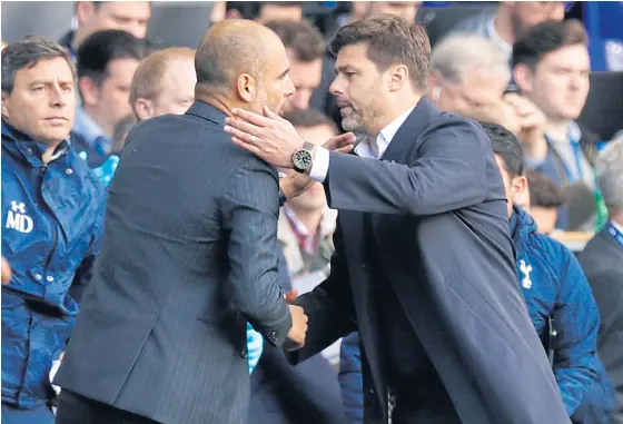  ??  ?? Manchester City manager Pep Guardiola, left, and Tottenham boss Mauricio Pochettino after their match in October.