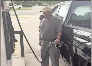  ?? / Doug Walker ?? Calvin Hosey of Kingston said on Thursday that the escalating gas prices were “killing” him.