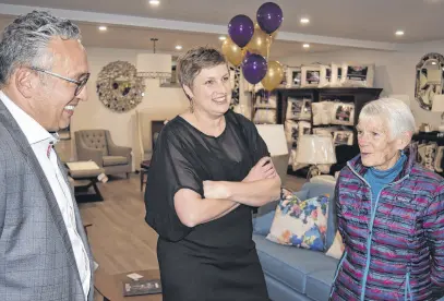  ??  ?? Members of the public were happy to see the opening of Costandi Designs’ new home in Truro. From left, Karl Costandi and interior designer Lori Byrne chat with a potential customer. FRAM DINSHAW/TRURO NEWS