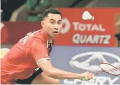  ??  ?? Indonesia’s Tommy Sugiarto hits a return to Spain’s Pablo Abian during their men’s singles badminton match at the Total BWF World Championsh­ip in Jakarta.