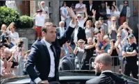  ?? PICTURE: AP ?? French President Emmanuel Macron waves as he leaves a polling station in Le Touquet, northern France, after casting his vote on Sunday.