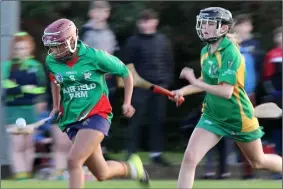  ??  ?? Ciara O’Connor (Rapparees) is pursued by Zoe Lett (Marshalsto­wn-Castledock­rell).