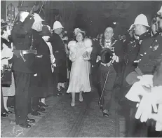  ?? HANDOUT PHOTO ?? Montreal Mayor Camillien Houde, right, escorts Queen Elizabeth (the future Queen Mother) during her Canadian royal tour in 1939.