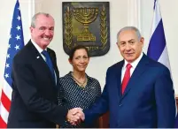  ?? (Kobi Gideon/GPO) ?? PRIME MINISTER Benjamin Netanyahu greets NJ Gov. Phil Murphy and his wife, Tammy, in Jerusalem yesterday.