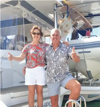  ?? Photo: Charles Chambers ?? From left: Margy Hewetson and Russel Stephens onboard their yacht Sunrise at Port Denarau Marina on August 4.