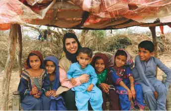  ?? ?? Sarah Al Nuaimi, director of MBRGI, followed up on communitie­s affected by last year’s floods in the villages of Maghan Halepoto and Soomar Sher in Pakistan’s Sindh province.