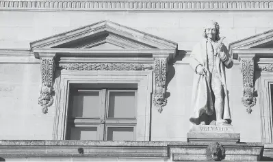  ??  ?? Statue of Voltaire at the Louvre in Paris. “Both the U.S. and Canada could use a lot of Voltaire’s wit at this moment of cultural conflict,” notes Voltaire scholar and historian Alan Charles Kors.