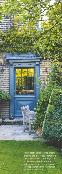  ??  ?? A cosy seating area nestled under a large magnolia provides shelter and shade. The romantic planting includes wildflower­s and herbs in shades of pink, white and purple and topiary shrub specimens. Find out more at butterwake­field.co.uk