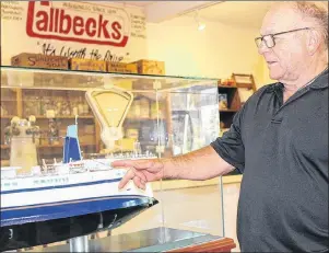  ?? MILLICENT MCKAY/JOURNAL PIONEER ?? Tilman Gallant points to a model of the MV Abegweit II. Gallant recalls the time two men jumped overboard while the boat was docking.