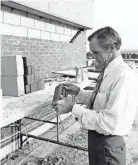  ?? UNF ?? University of North Florida President Dr. Thomas G. Carpenter, overseeing constructi­on of Building 1 in 1972.