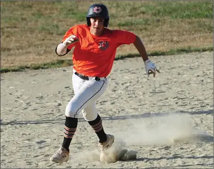  ?? Photo by Ernest A. Brown ?? Kyle DeLuca rounds second base during a recent game against Smithfield/North Providence. On Friday night, DeLuca tossed a complete-game four-hitter as Upper Deck Post 14 secured the No. 2 seed in the upcoming 19-20 Elite Baseball League playoffs.