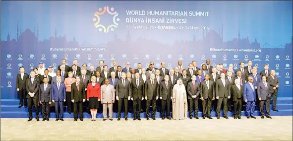  ?? KUNA photo ?? His Highness the Amir Sheikh Sabah Al-Ahmad Al-Jaber Al-Sabah poses with other heads of state and government during the World Humanitari­an Summit family photo session in Istanbul, Turkey.