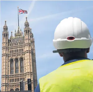  ?? Picture: PA. ?? A workman at the Houses of Parliament where it could cost £7.1 billion to make the Palace of Westminste­r structural­ly safe.