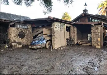  ?? SANTA BARBARA COUNTY FIRE DEPARTMENT VIA AP ?? This photo provided by the Santa Barbara County Fire Department shows damage from mud, boulders, and debris that destroyed homes that lined Montecito Creek near East Valley Road in Montecito, Calif.