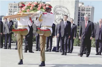  ??  ?? Chinese Premier Li Keqiang stands near Cuba’s Vice President Miguel Diaz Canel during a wreath laying ceremony for Cuba’s independen­ce hero Jose Marti at Revolution Square in Havana on Saturday. — Reuters