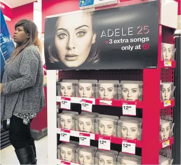  ??  ?? MILLION-DOLLAR RIFF: Adele has sold more albums than anyone thought was still possible, a projected 3.2 million copies.